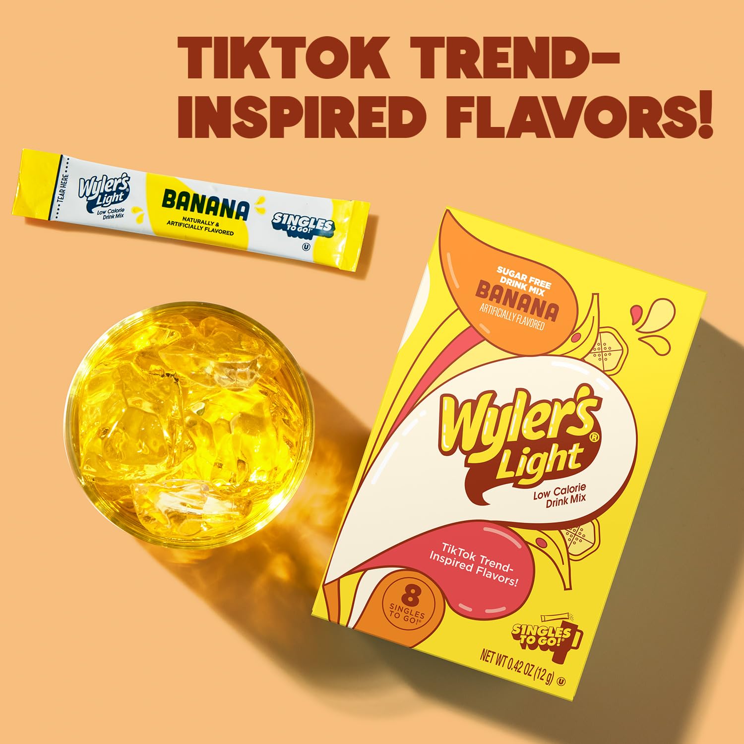 Wyler's Light Watertok Banana in a glass for refreshing hydration outdoors.