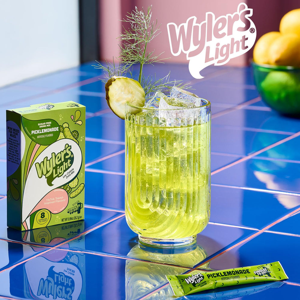 Dissolving Wyler's Light Picklemonade packet in water for flavor