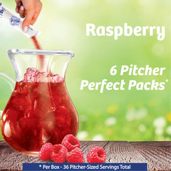 Wyler's Light Raspberry powder dissolving in water for quick mix