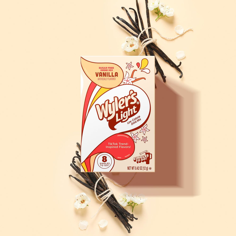 Wyler's Light Vanilla powder being poured into a water bottle for quick prep.