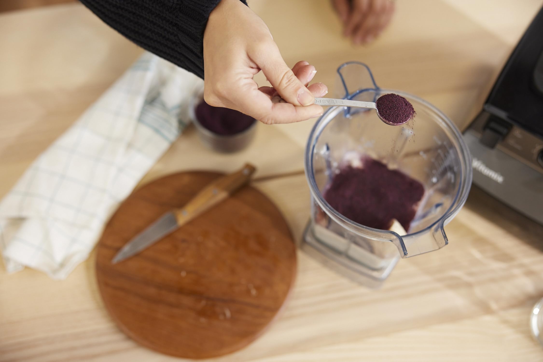 Powder sprinkled into a smoothie for berry-rich flavor and color.