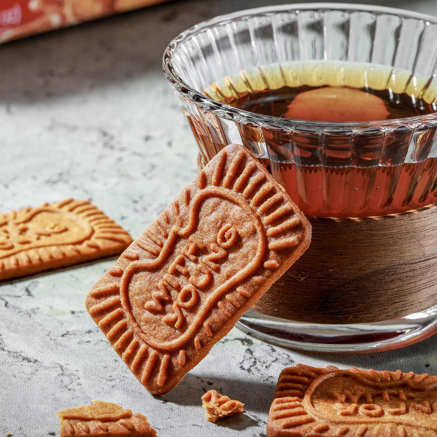 WZY snack-ready biscotti near a lunchbox suggests portability