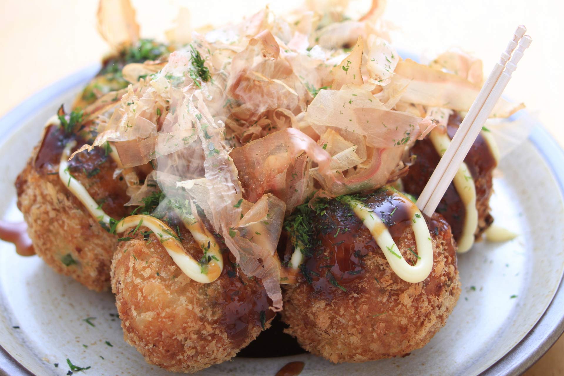 Yamaki bonito flakes sprinkled on yakisoba for savory lift