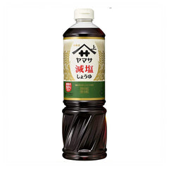 Yamasa Less Salt Soy Sauce bottle pour for healthier flavoring in stir-fries.