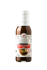 Yamasa Shoyu broth concentrate bottle highlighting rich umami for ramen and sauces.