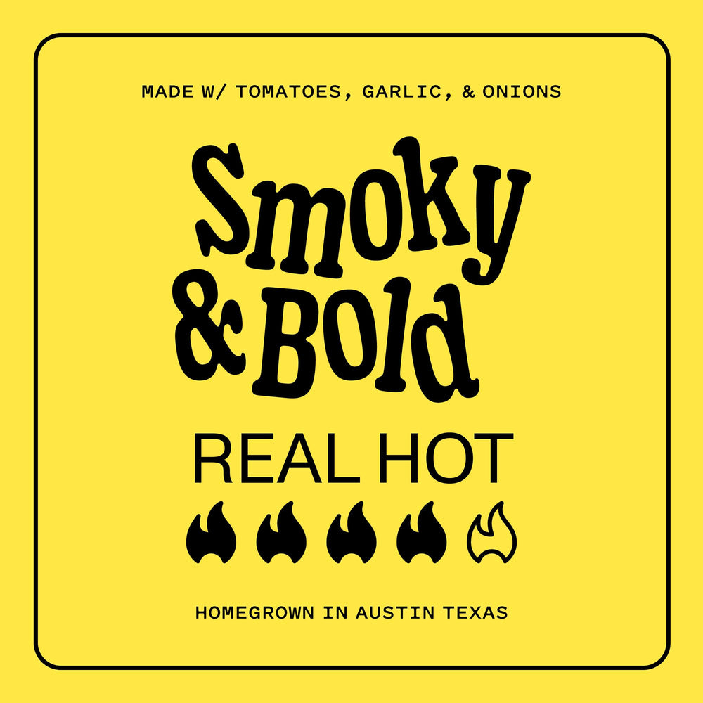 Yellowbird Classic Ghost Pepper hot sauce being poured for bold flavor