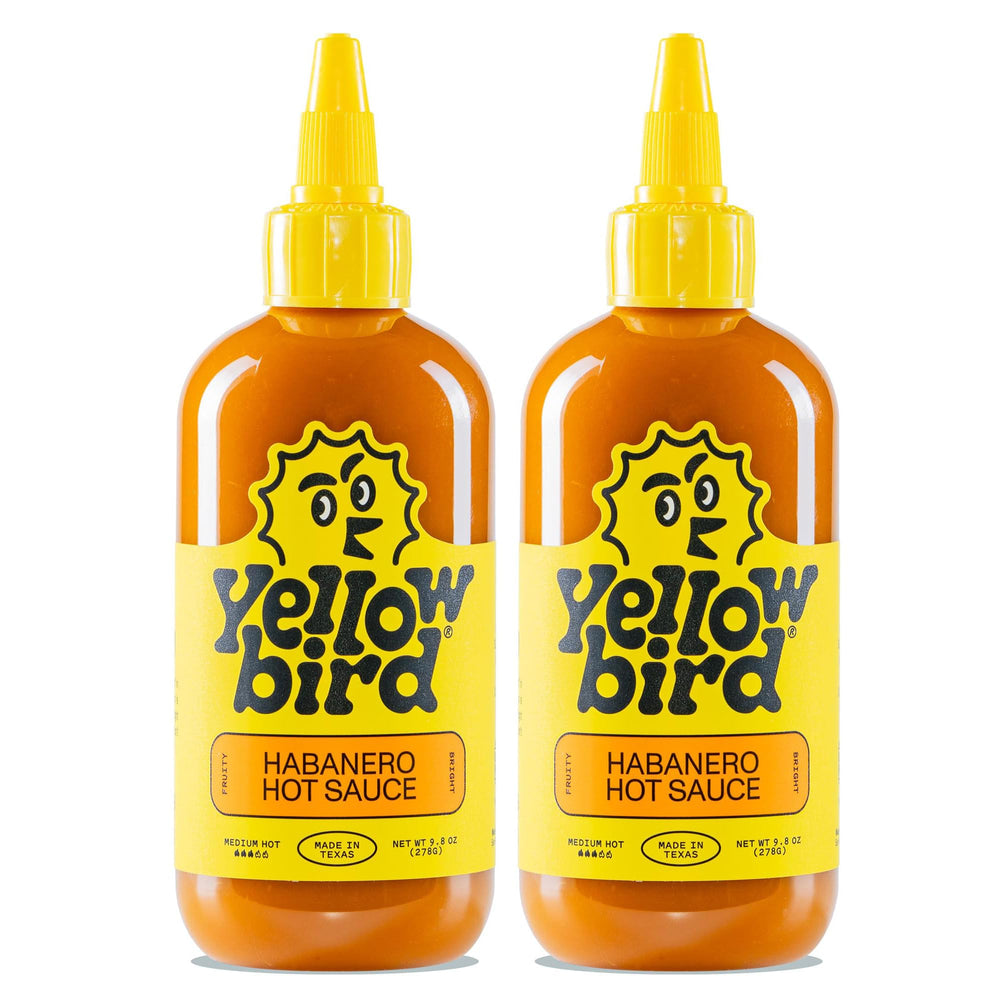 Yellowbird Classic Habanero hot sauce pour-over shot adding bright tropical heat.
