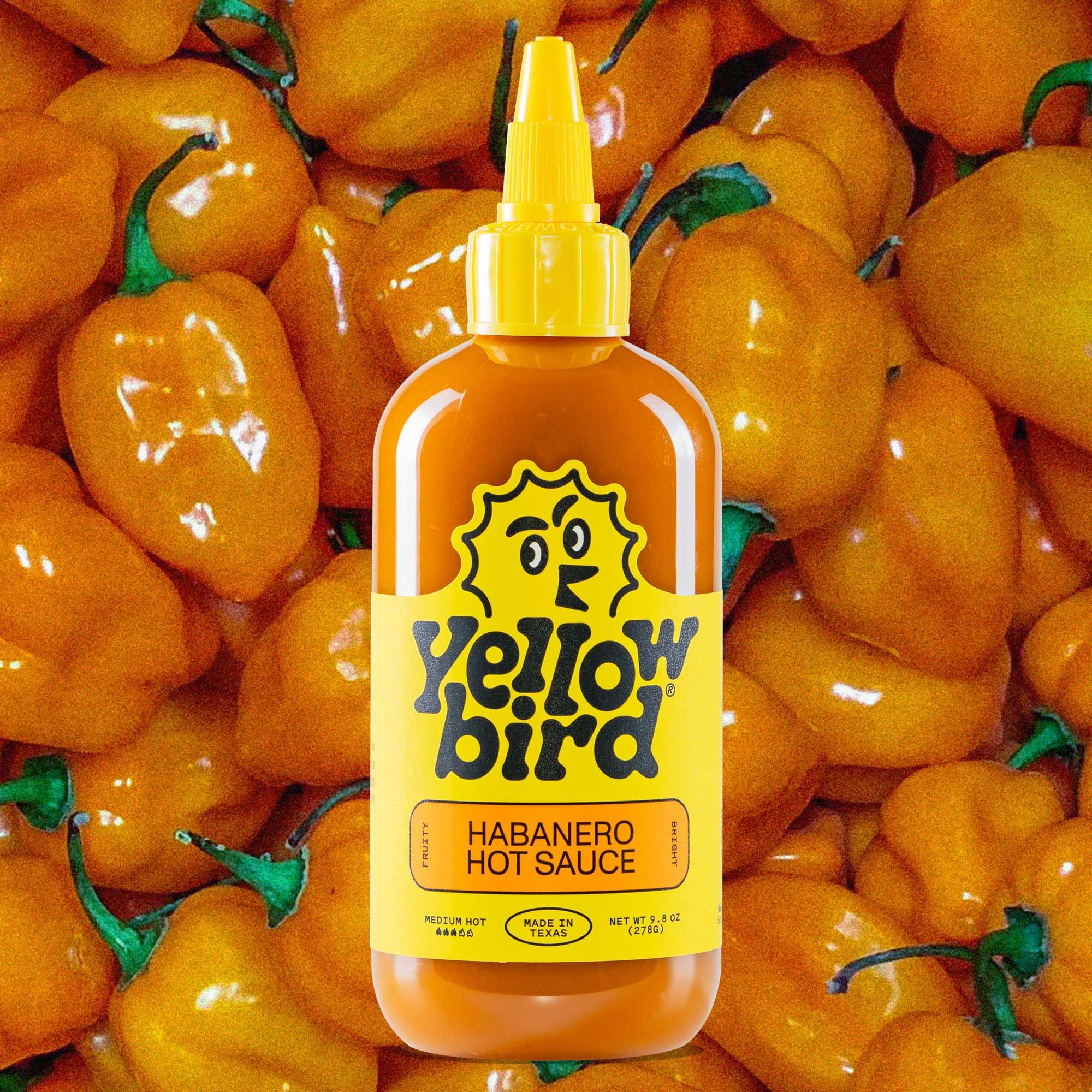Yellowbird Classic Habanero on tacos delivering fruity heat and brightness.