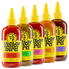 Yellowbird Classic Hot Sauce Variety Set bottles on counter offer bold flavor choices.