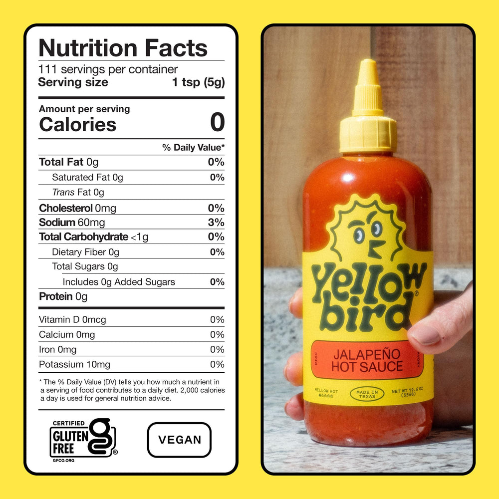 Yellowbird Classic Jalapeño hot sauce label close-up highlights vegan and gluten-free ingredients.