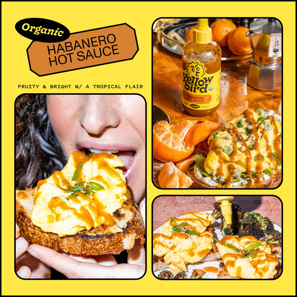 Yellowbird Organic Habanero Hot Sauce glass bottle on a kitchen shelf.