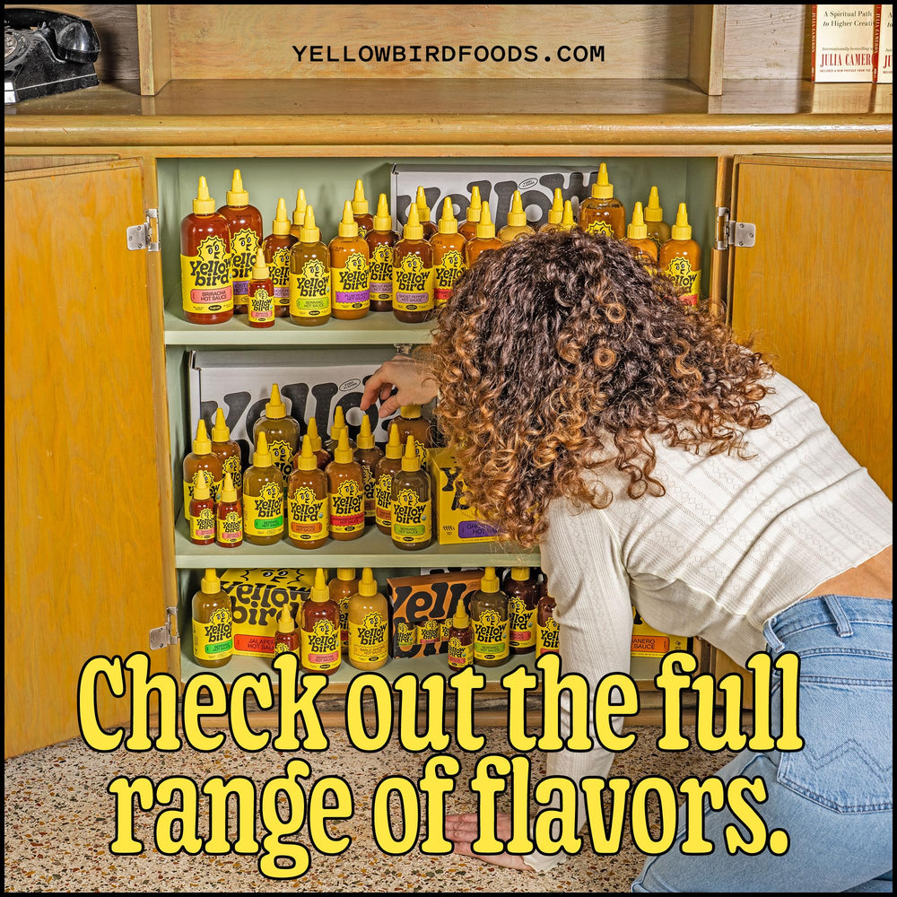 Kitchen scene with Yellowbird Organic Habanero Hot Sauce ready to elevate a meal.