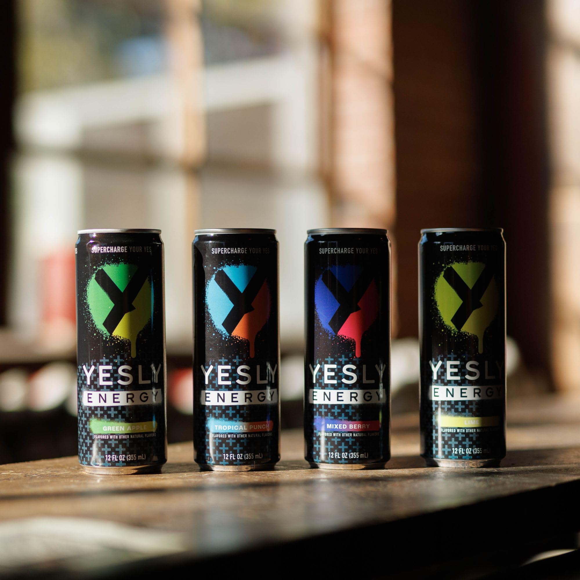 Yesly Energy healthy hydration setup with glass and can.