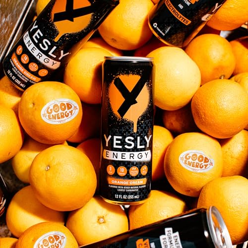 Yesly Energy Orange Cream glass pour illustrating refreshingly fizzy drink for workouts