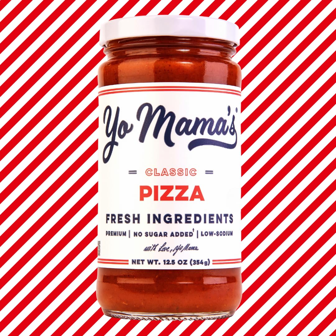 Yo Mama’s Foods Keto Classic Pizza Sauce being poured over a fresh pizza slice for tasty meals.