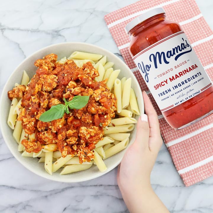 Yo Mama's Foods Keto Spicy Marinara spoon-dipping action highlights thick texture