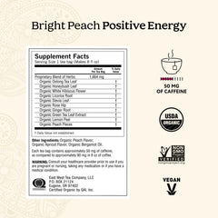 Yogi Bright Peach Positive Energy tea bag for a refreshing morning boost.