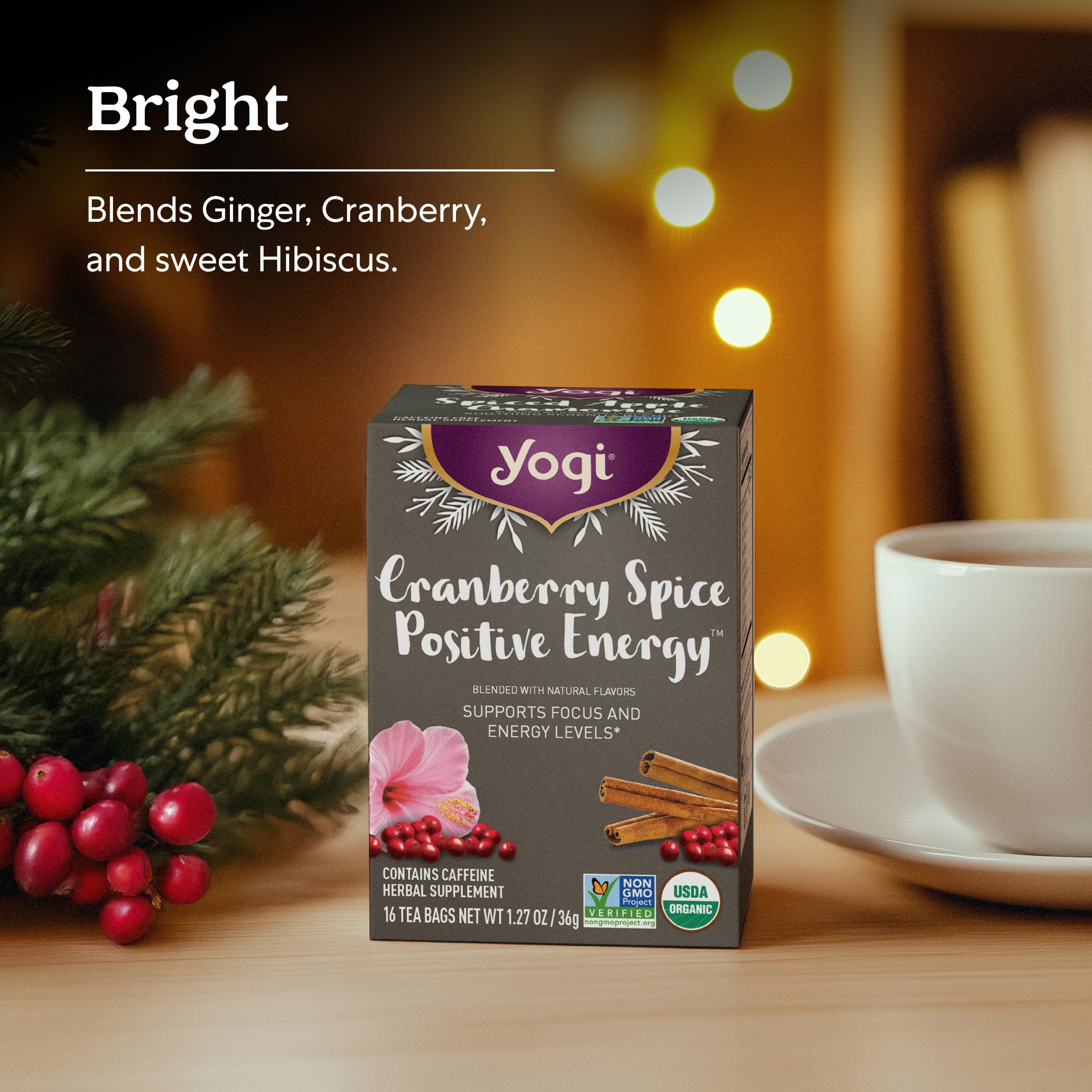 Yogi Cranberry Spiced Positive Energy tea cup with steam highlights festive spice notes.
