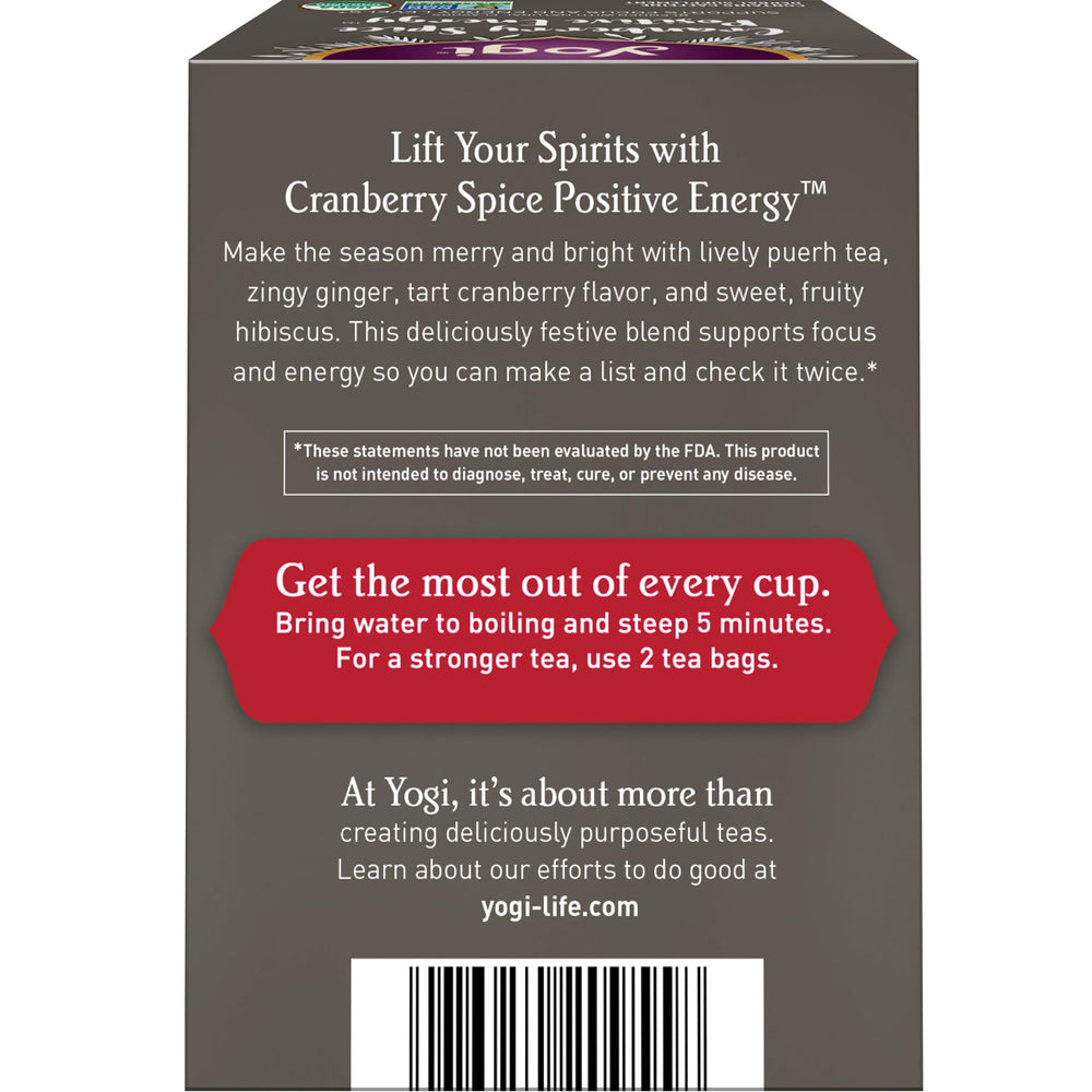 Yogi Cranberry Spiced Positive Energy brew-steeped cup releasing vibrant aroma and caffeine lift.