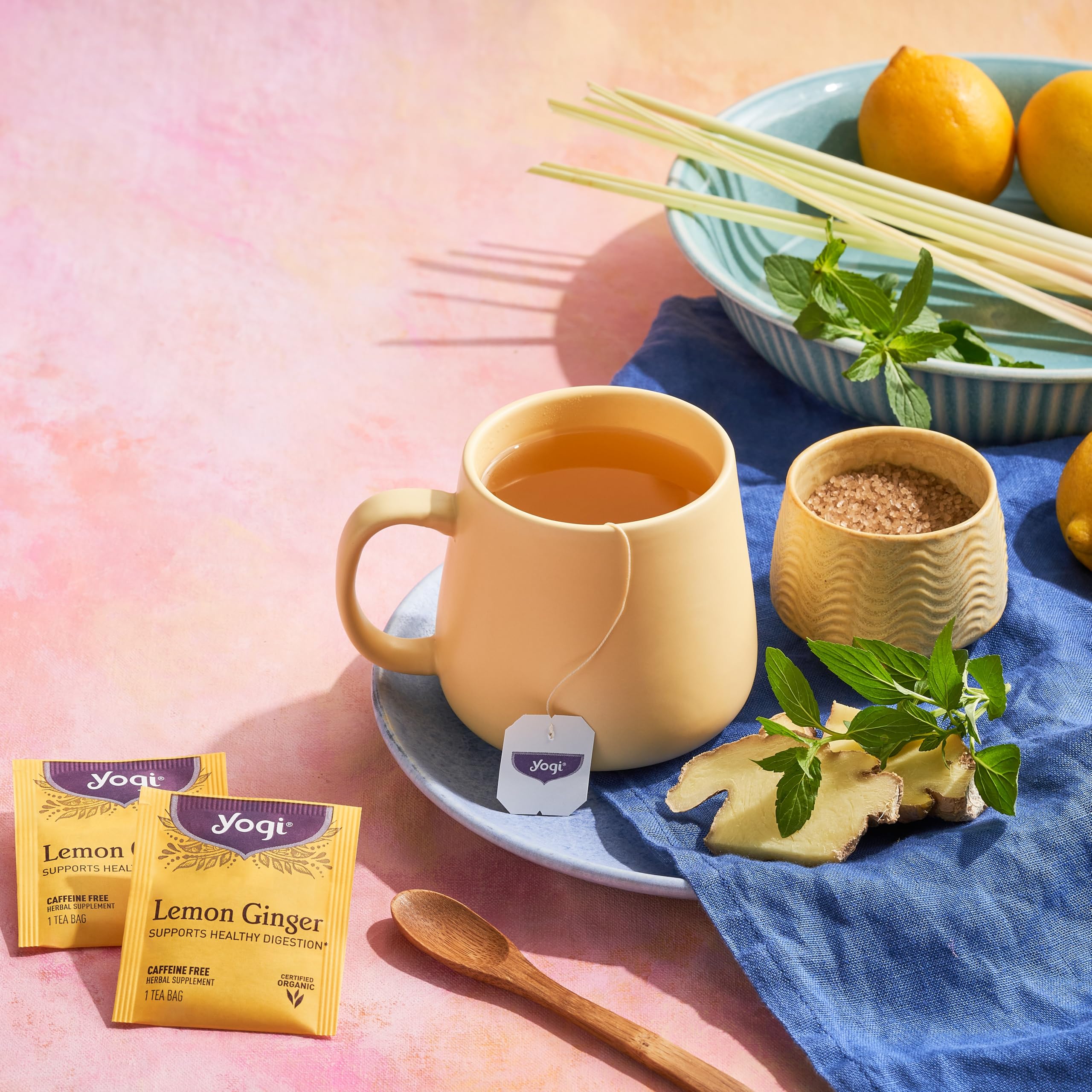 Compostable Yogi Lemon Ginger tea bag, a convenient caffeine-free option.