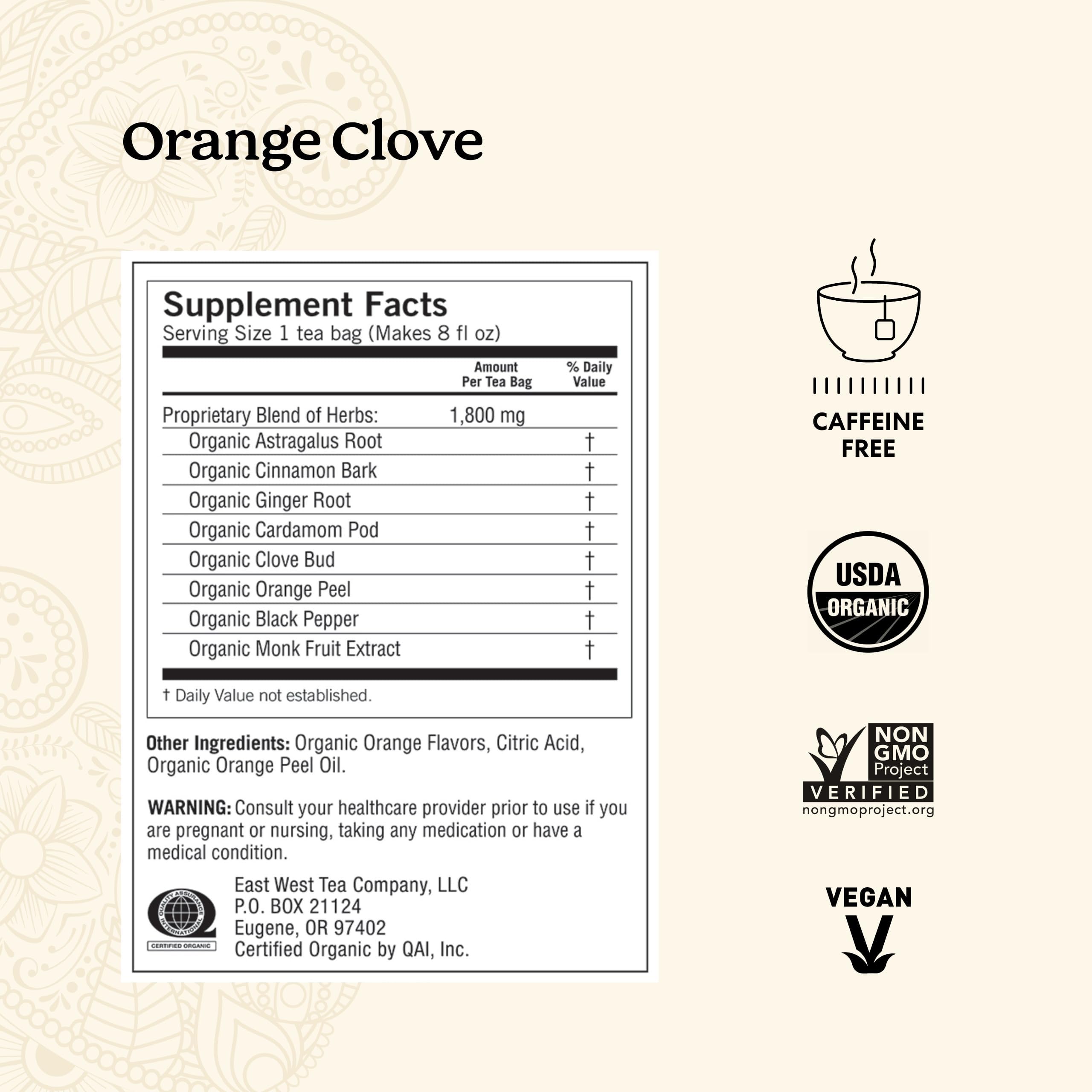 Steeping Yogi Orange Clove tea in a cup releasing citrus-spice fragrance