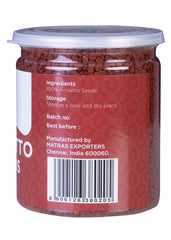 Yogi's Gift annatto seeds closeup shows natural texture ideal for cooking.