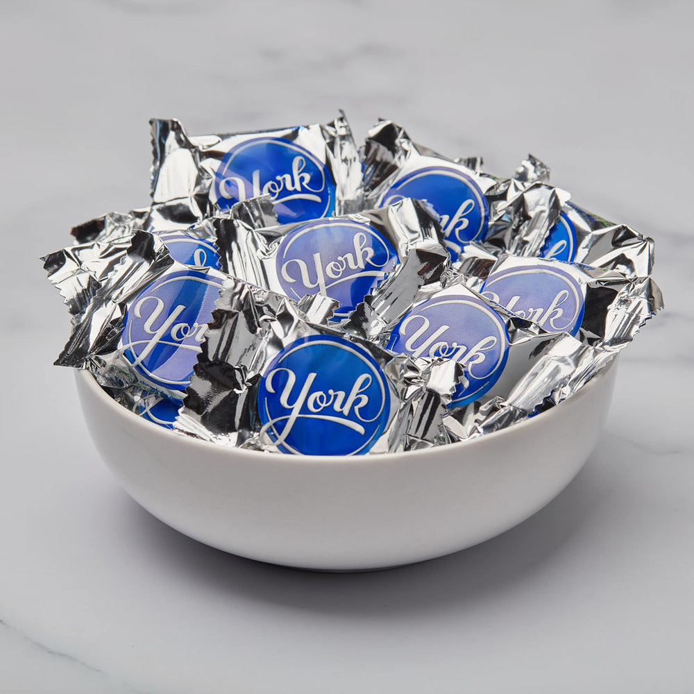 YORK Dark Chocolate Peppermint Patties arranged on a dessert dish for gatherings