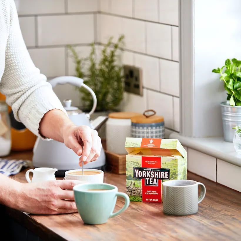 Brewing color in a cup with Yorkshire Tea showing deep amber infusion