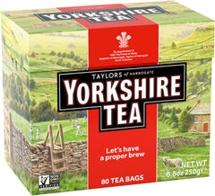 A cup with steeped Yorkshire Tea showing strong aroma and color