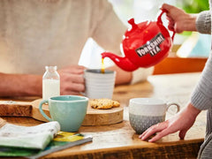 Yorkshire Tea Gold cup with milk illustrates traditional serving.