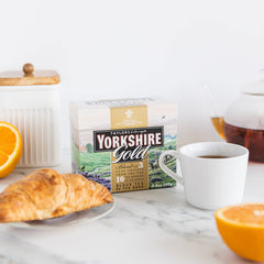 Yorkshire Tea Gold box of 80 tea bags for convenient caffeinated mornings.