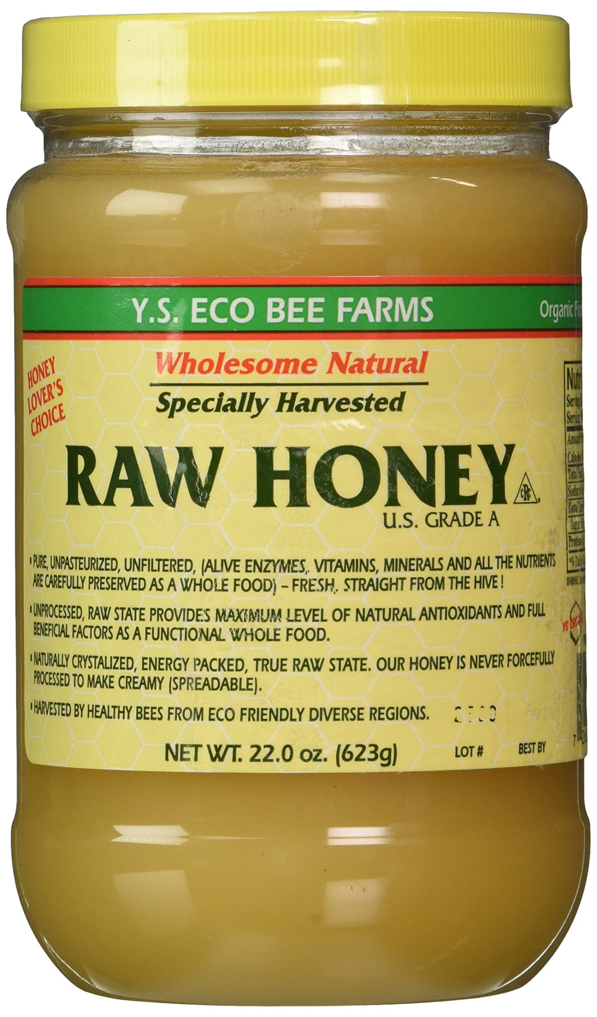 YS Eco Bee Farms Raw Honey bottle with amber drizzle, ideal for natural sweetening.