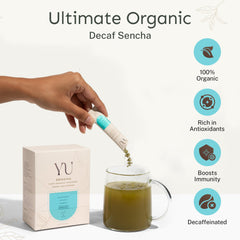 Closeup of Yu Tea Decaf Sencha packets highlighting organic leaves