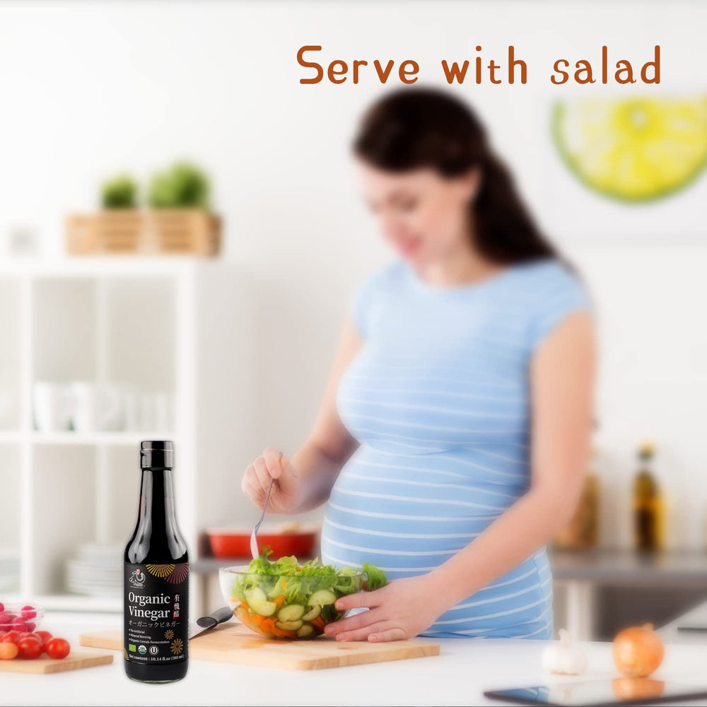 YUHO Organic Black Vinegar added to risotto for tangy balance.