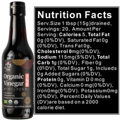 YUHO Organic Black Vinegar and dumplings for savory dipping.