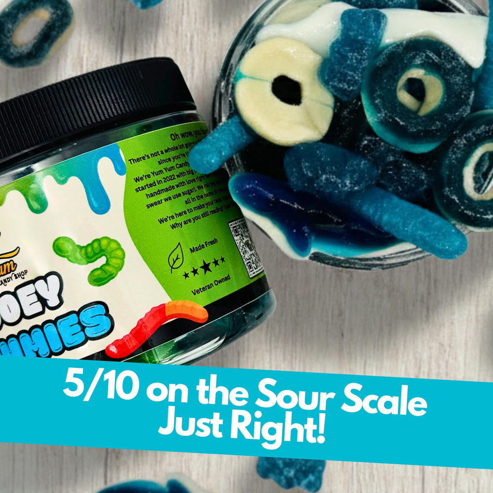 Gooey tangy blue raspberry gummies satisfy cravings with playful texture