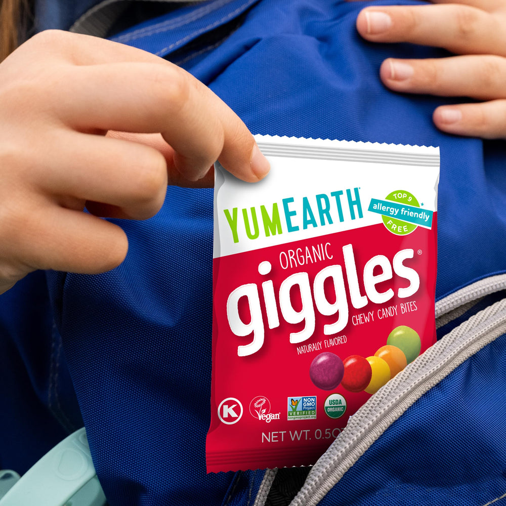 YumEarth Giggles allergen-free badge visible, reassuring for sensitive diets.
