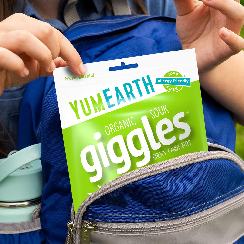 5 oz YumEarth Sour Giggles bag displayed on kitchen shelf.