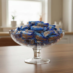 Yummy Chew AlmondJoy bar close-up – creamy coconut center with crunchy almonds.