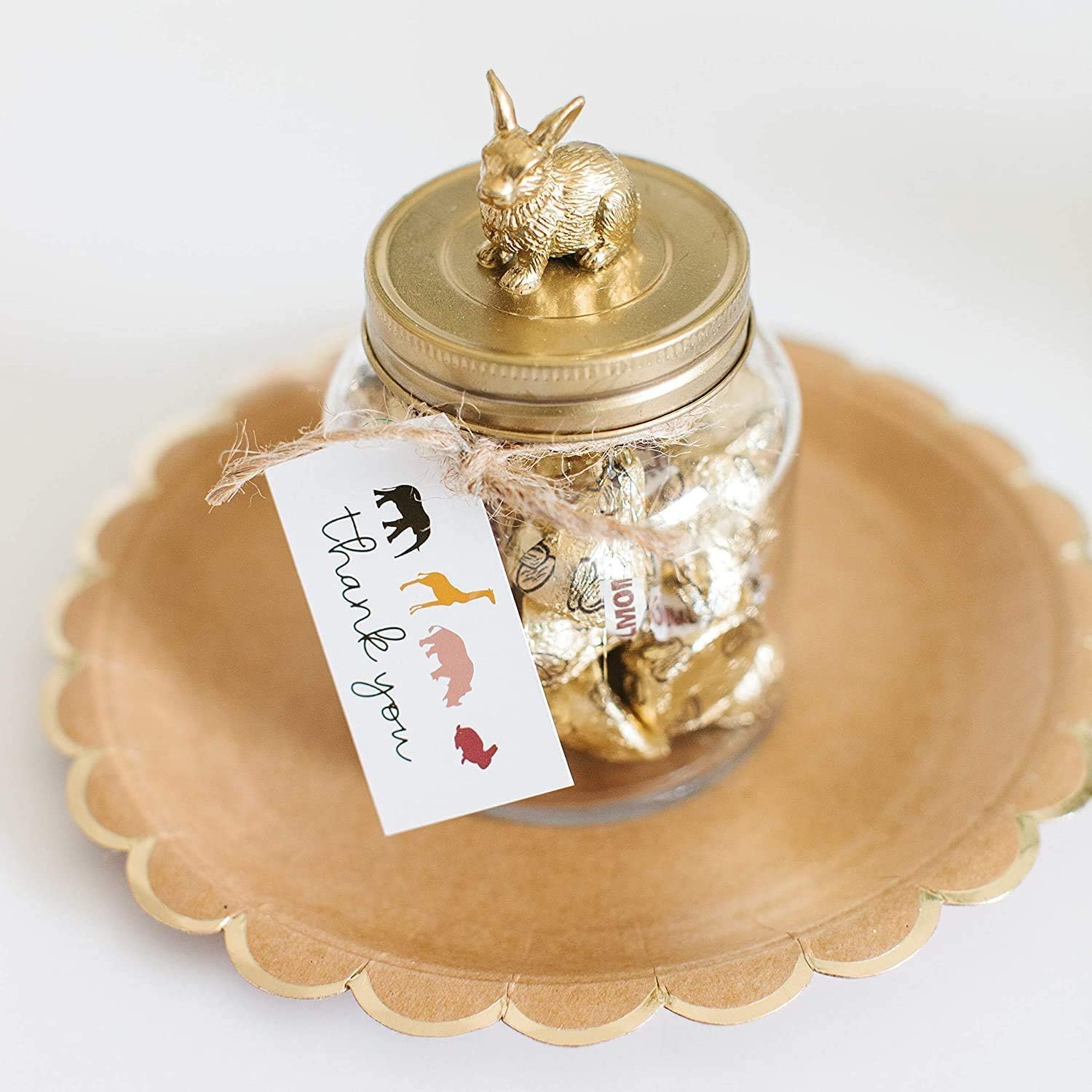Serving bowl of Yummy Chew Kisses with Almonds for dessert tables.