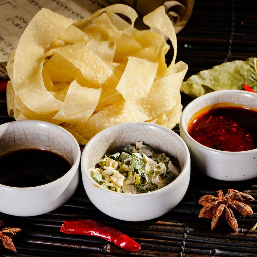 Noodles being prepared with seasoning for quick, flavorful meals