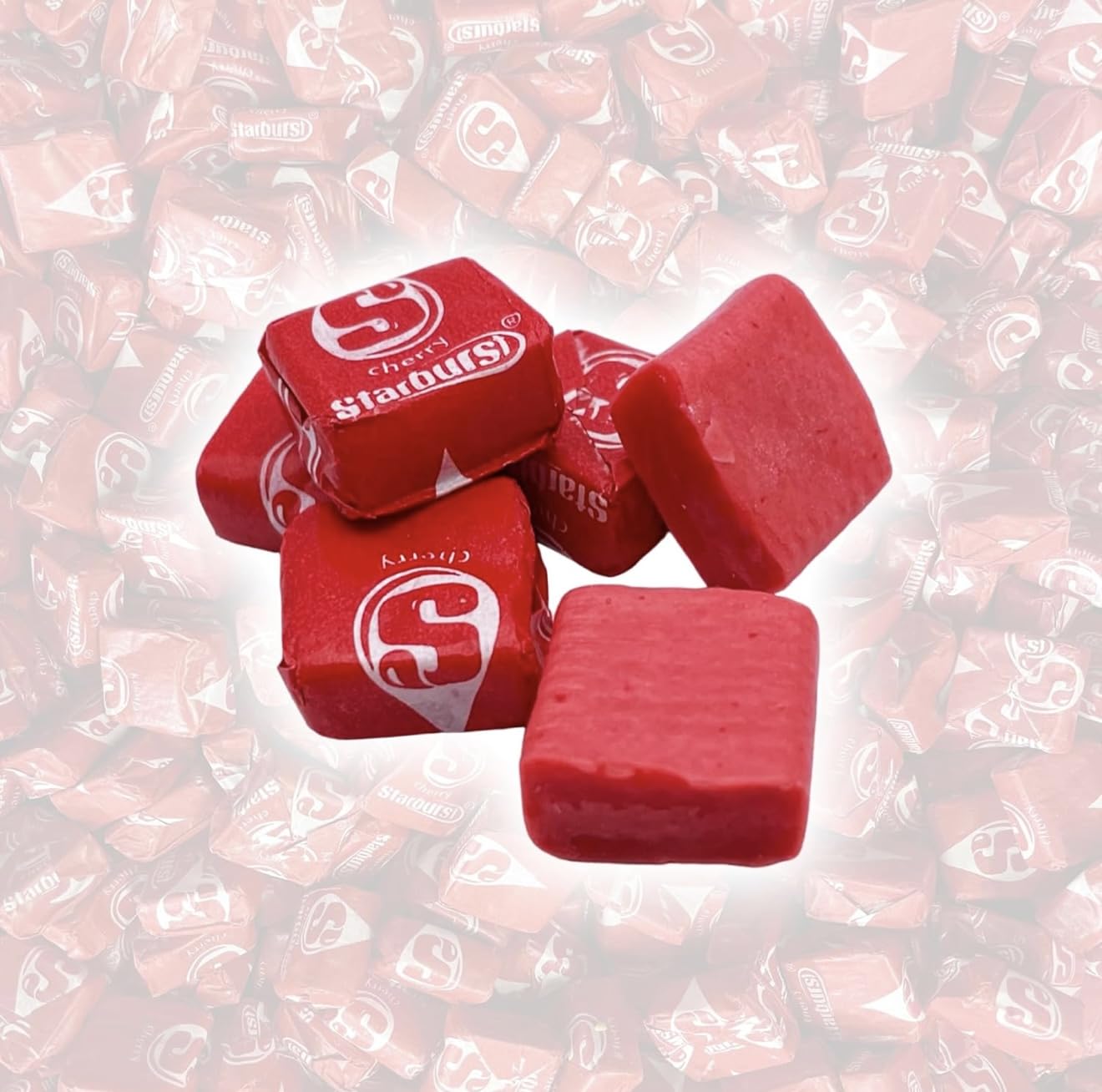 YUMMYLAND Star Bursts Cherry candy jar display with bright red fruit flavors.