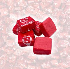 YUMMYLAND Star Bursts Cherry candy jar display with bright red fruit flavors.
