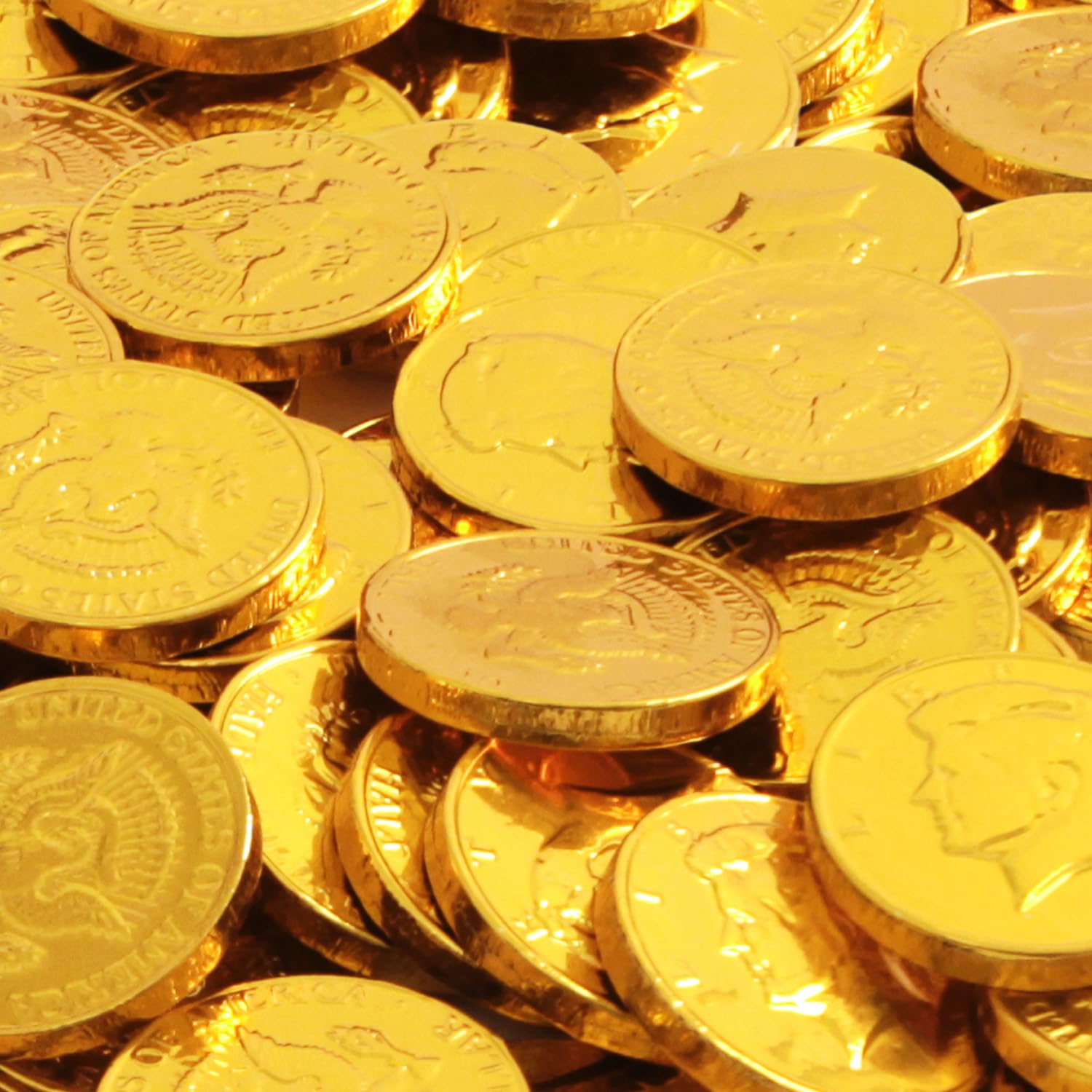 Yumzo gold chocolate coins with shimmering foil arranged for a buffet