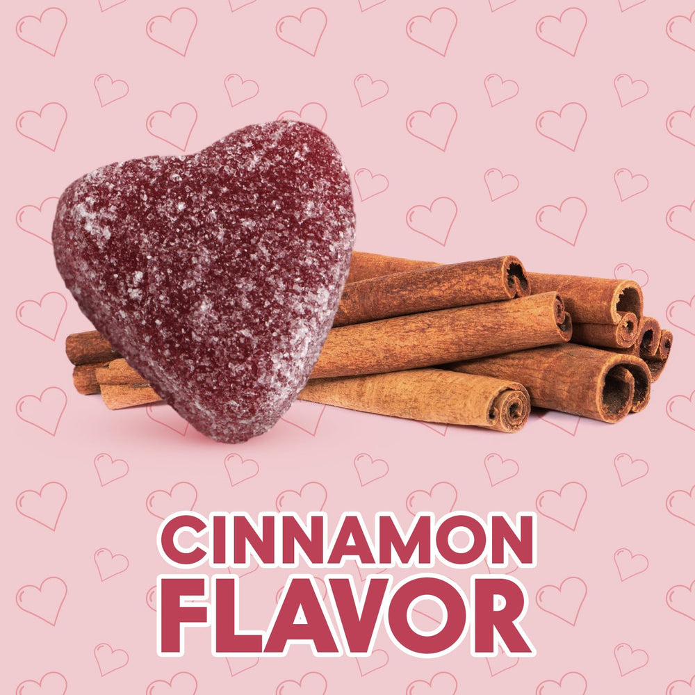 Closeup of Yumzo cinnamon jelly hearts showing chewy texture and vibrant red color