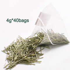 YUNHAHA Pine needle tea in cup highlighting bright pale green infusion and forest notes