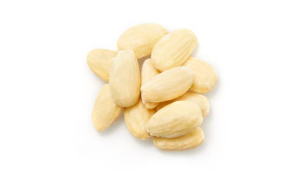 Yupik almond texture close-up, crunchy flavor great for salads and toppings.