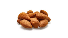 Yupik almonds in a kitchen jar emphasizing unsalted, sugar-free snack options.