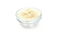 Yupik Organic Baobab Powder in a smoothie glass with citrus hues
