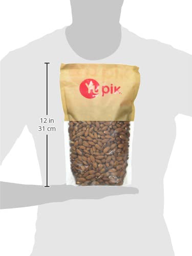 Yupik California raw almonds small dark color closeup, shows nuttier, richer kernels